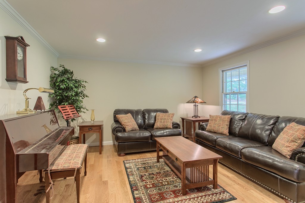10 Farley Brook Road Chelmsford, MA 01824 - Photo 4 of 30 a living room with furniture and a couch