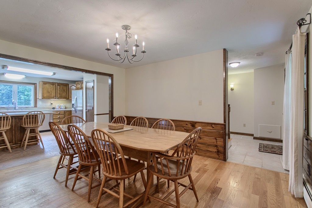 10 Farley Brook Road Chelmsford, MA 01824 - Photo 5 of 30 a view of a dining room with furniture and chandelier