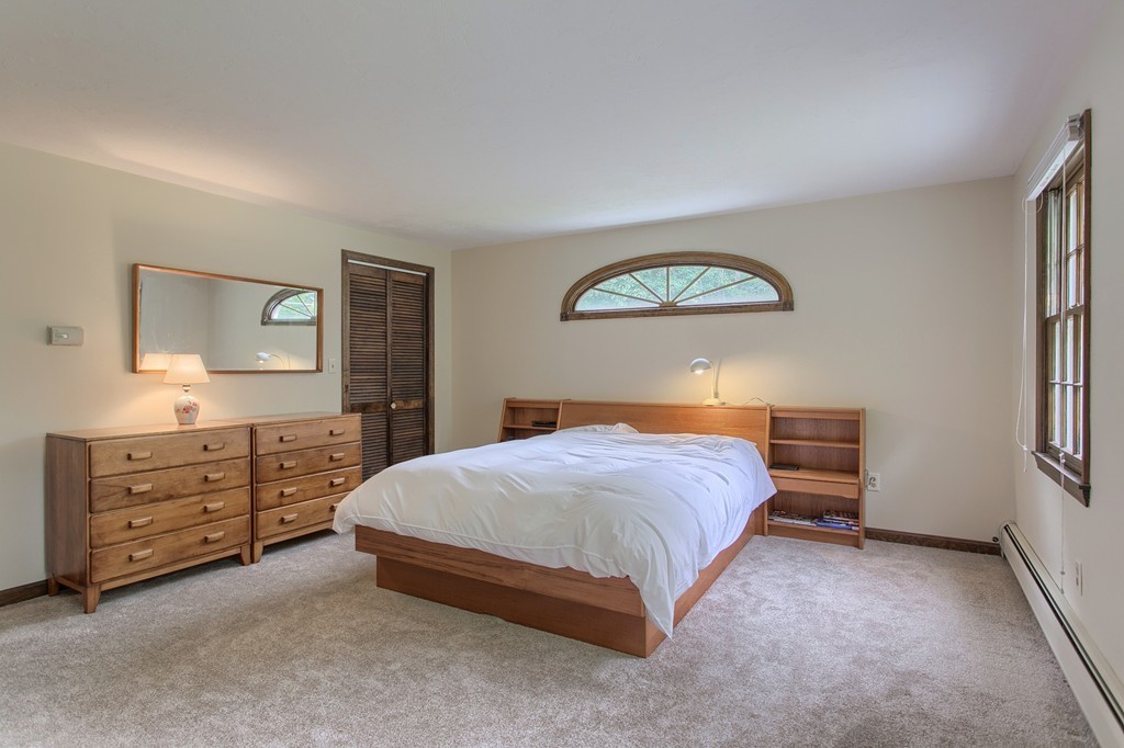10 Farley Brook Road Chelmsford, MA 01824 - Photo 10 of 30 a bedroom with a bed and a dresser