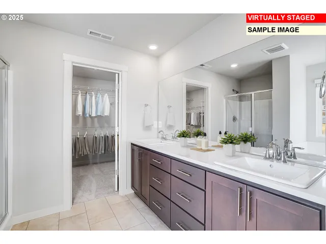 a bathroom with a sink a shower and a mirror