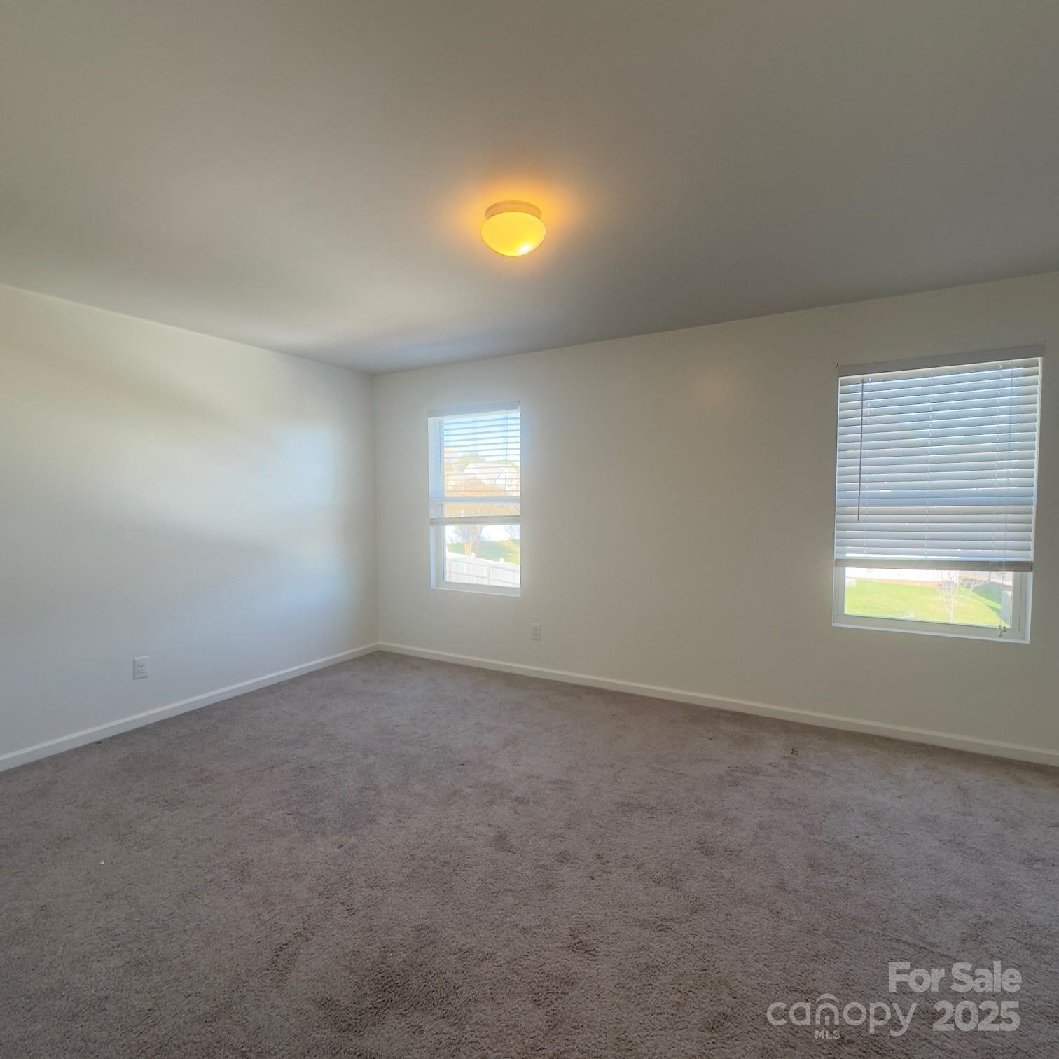 105 Abel Peterson Drive Mount Holly, NC 28120 - Photo 11 of 36 a view of empty room with window