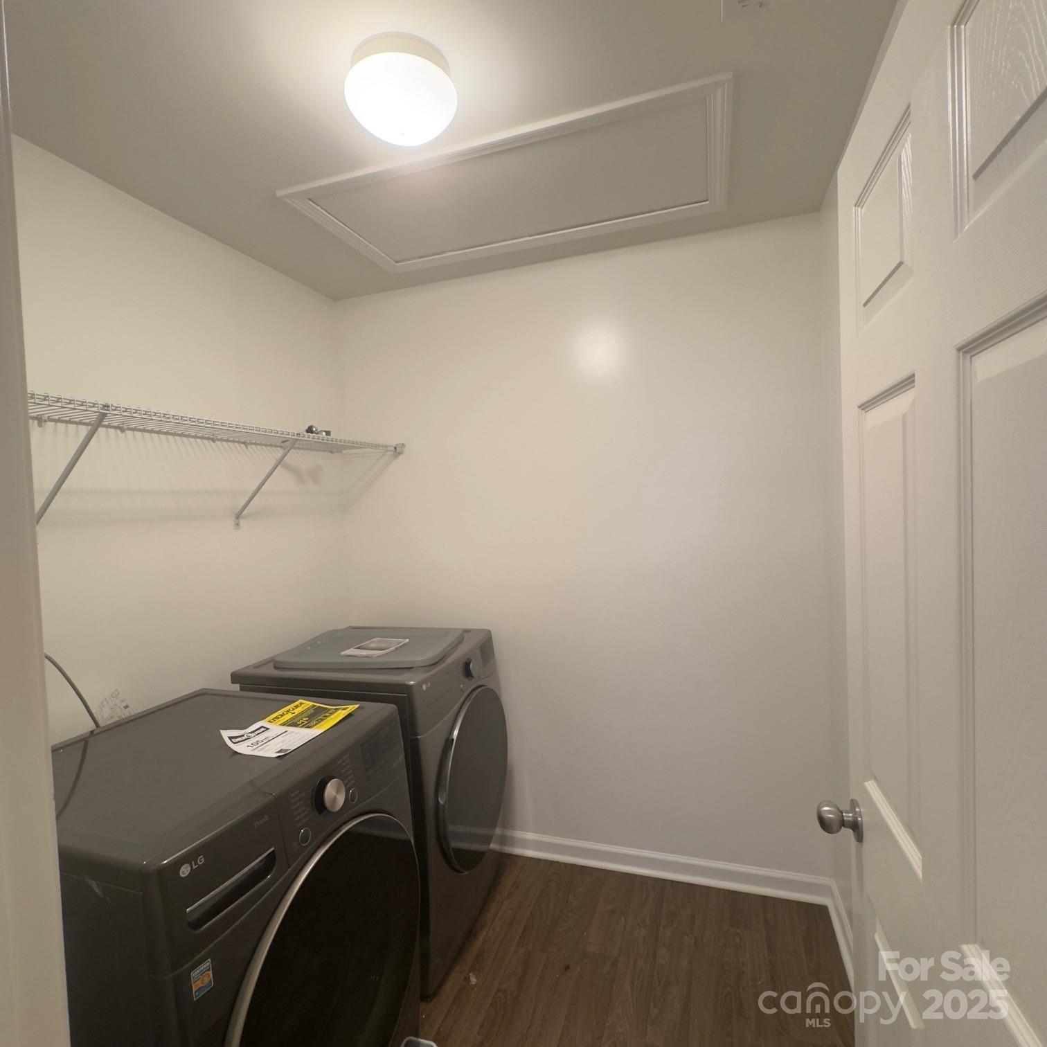 105 Abel Peterson Drive Mount Holly, NC 28120 - Photo 14 of 36 a view of storage and utility room with racks on the wall