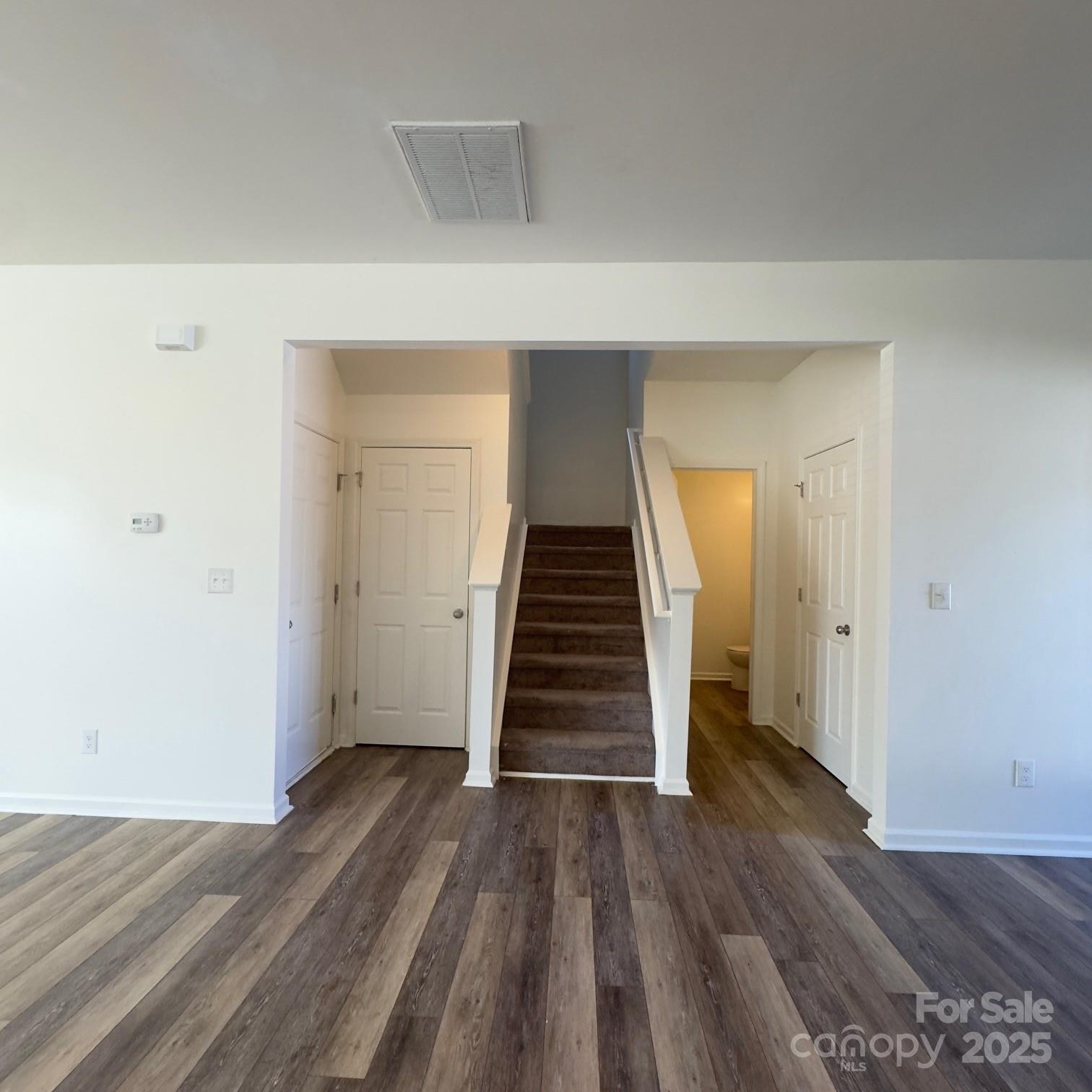 105 Abel Peterson Drive Mount Holly, NC 28120 - Photo 29 of 36 wooden floor in an empty room