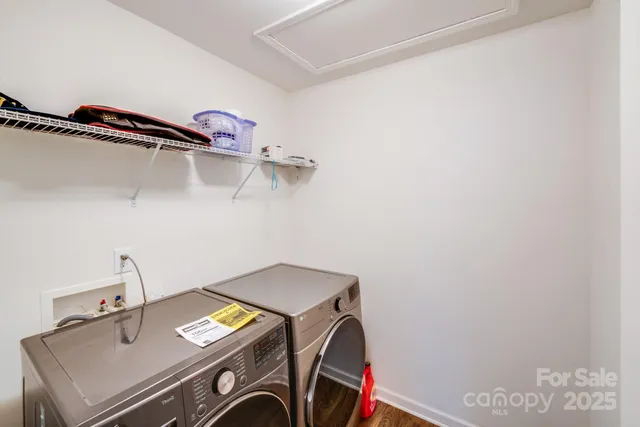 a utility room with dryer and washer