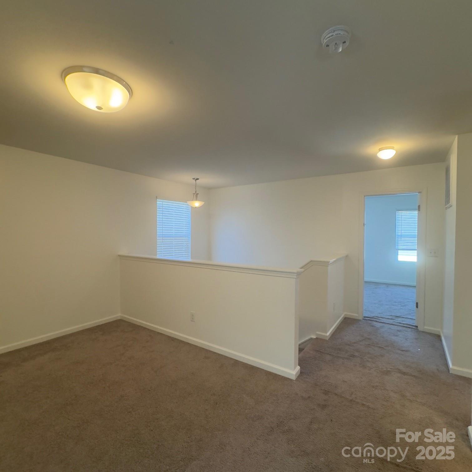 105 Abel Peterson Drive Mount Holly, NC 28120 - Photo 8 of 36 a view of an empty room