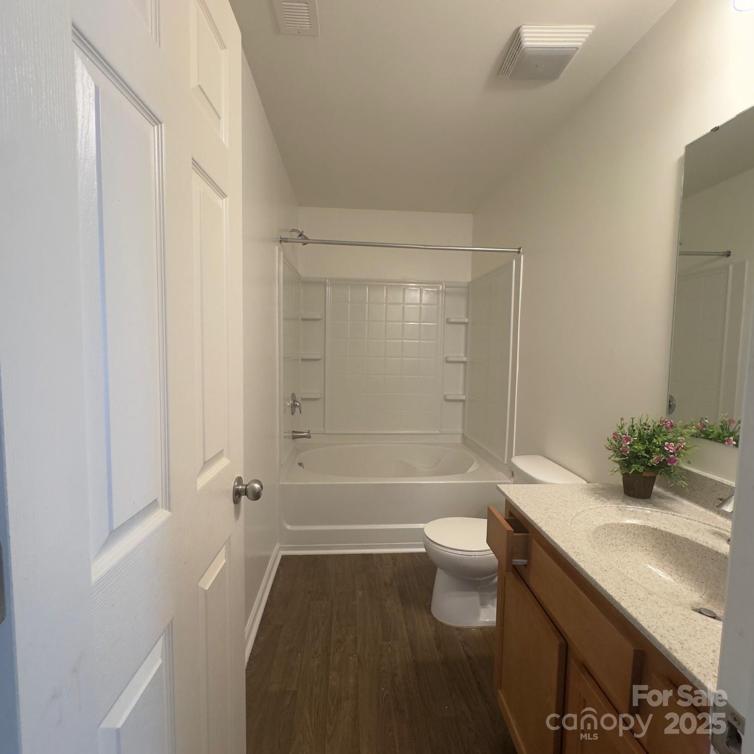 105 Abel Peterson Drive Mount Holly, NC 28120 - Photo 10 of 36 a bathroom with a sink a toilet and shower