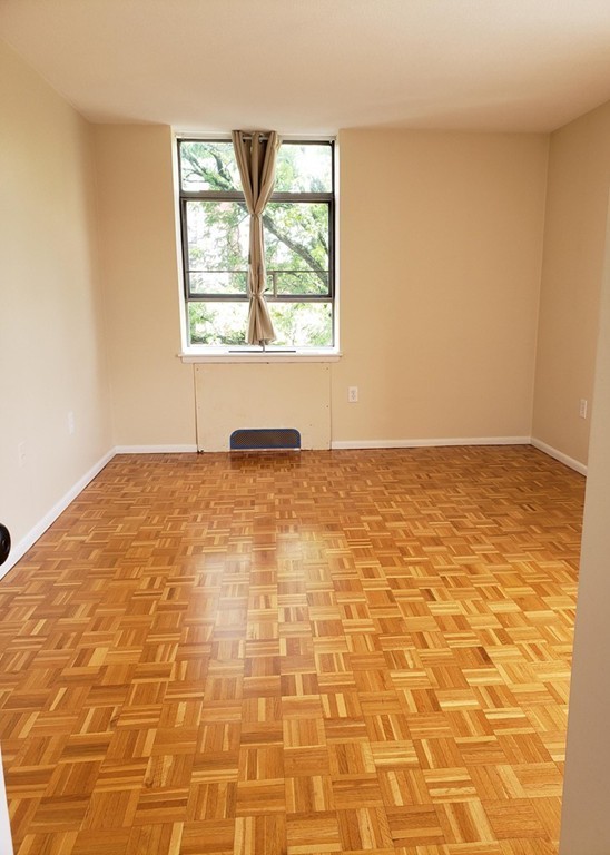 80 Salisbury Street, Unit 303 Worcester, MA 01609 - Photo 12 of 17 an empty room with a window