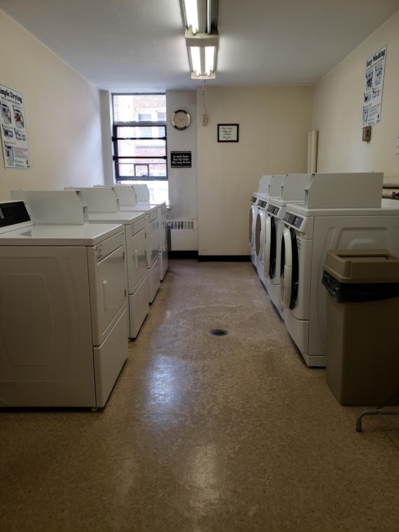 80 Salisbury Street, Unit 303 Worcester, MA 01609 - Photo 17 of 17 a utility room with dryer and washer