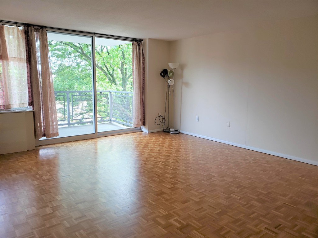 80 Salisbury Street, Unit 303 Worcester, MA 01609 - Photo 10 of 17 a view of a room with wooden floor and a window