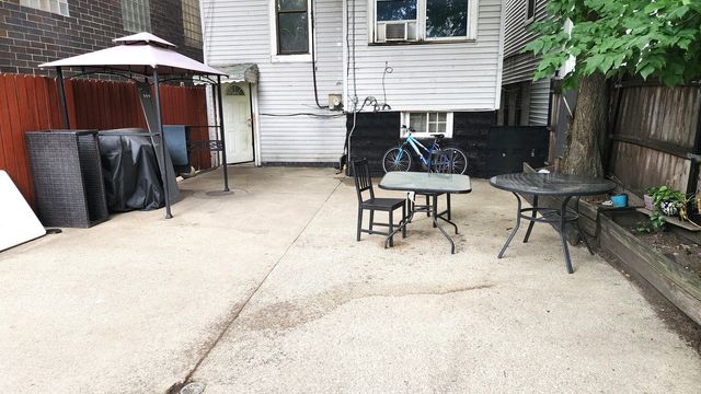 a front view of a house with patio