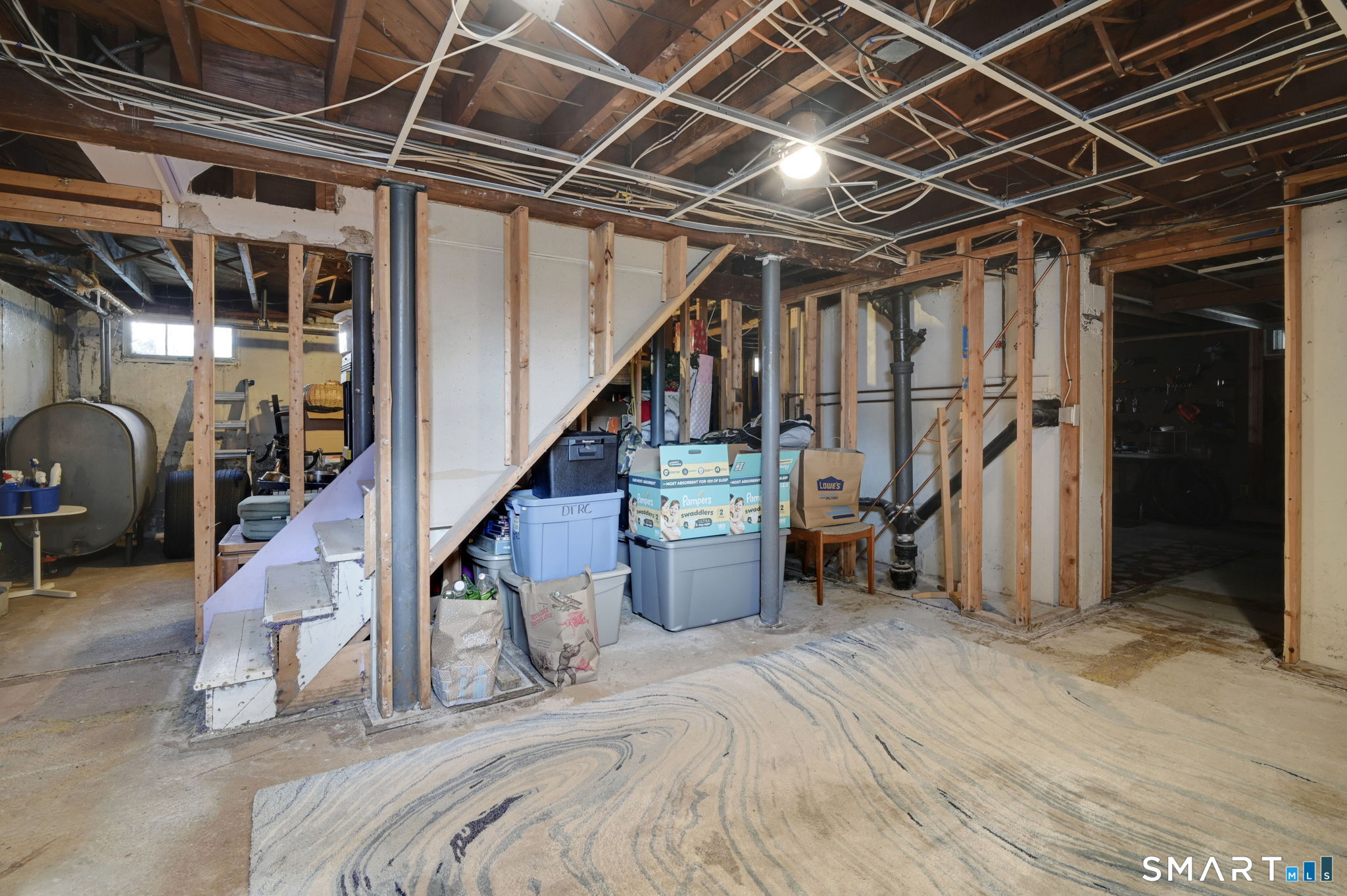 61 Cedar Street Newington, CT 06111 - Photo 38 of 39 Lower level has over 1000 sf of heated space! Framing, electrical and lighting done.