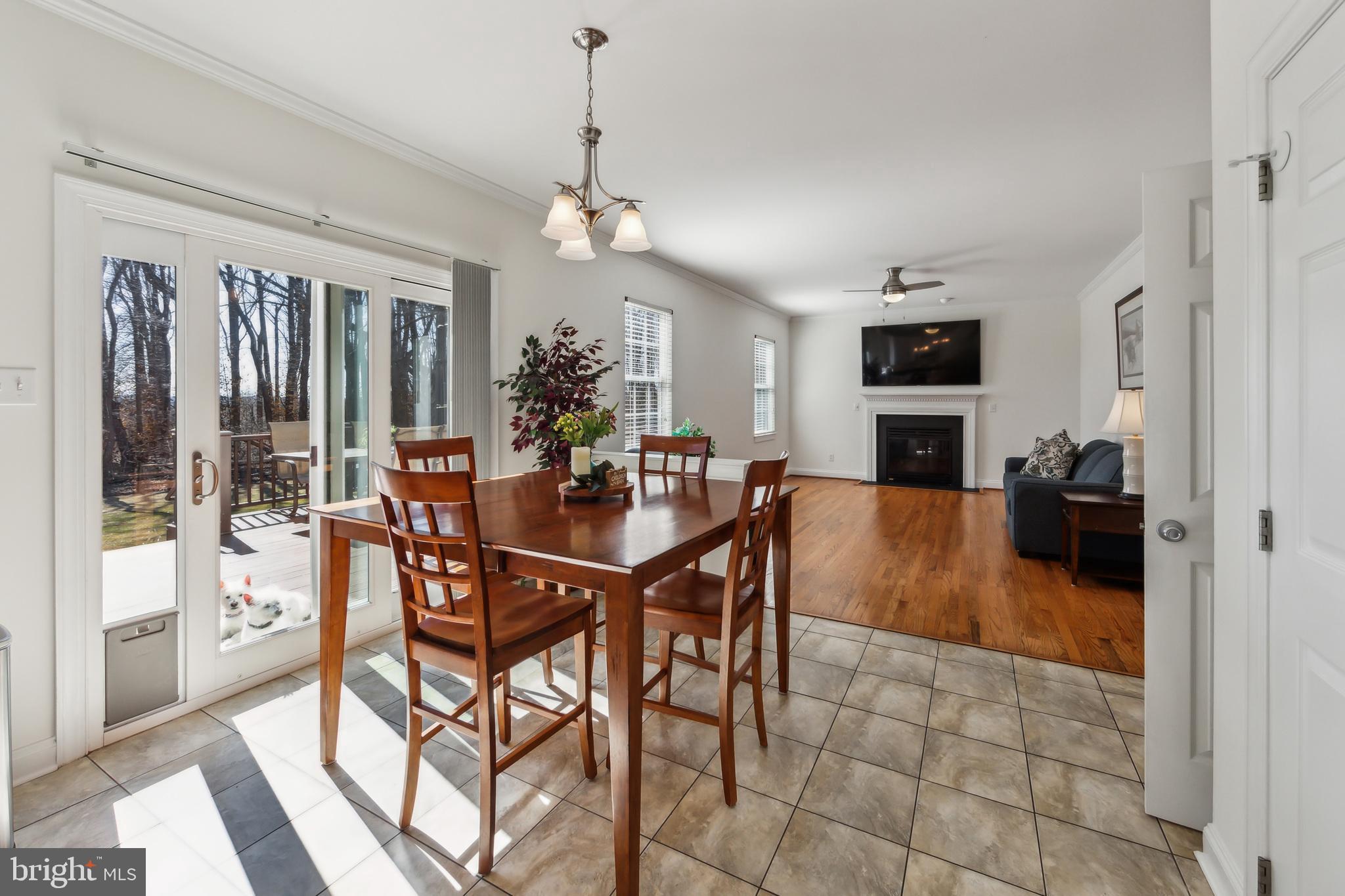 684 Highspire Road Glenmoore, PA 19343 - Photo 11 of 46 a view of a dining room with furniture window and outside view