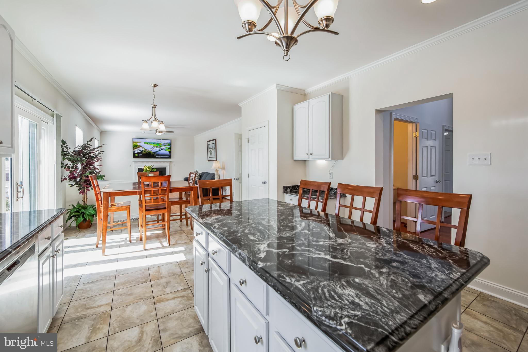 684 Highspire Road Glenmoore, PA 19343 - Photo 14 of 46 a view of kitchen island with granite countertop living room