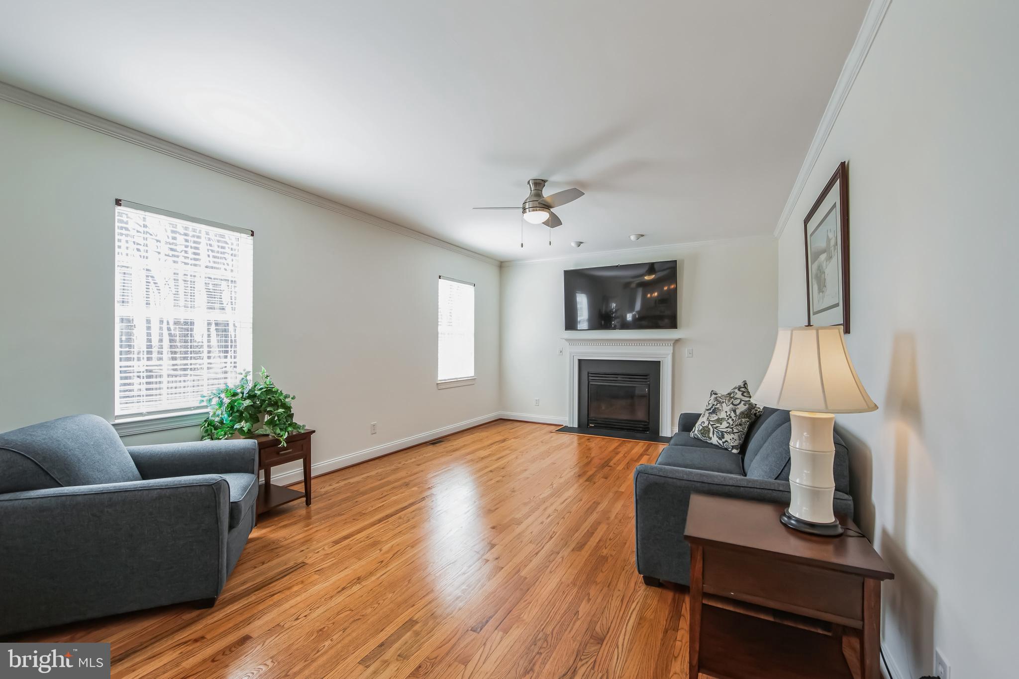 684 Highspire Road Glenmoore, PA 19343 - Photo 15 of 46 a living room with furniture and a fireplace