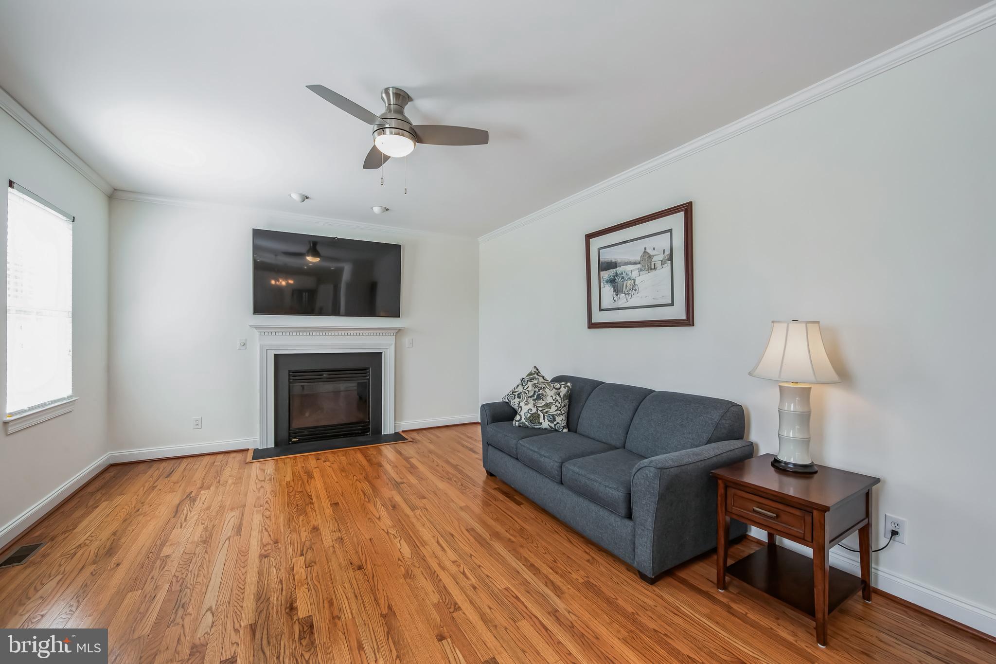 684 Highspire Road Glenmoore, PA 19343 - Photo 16 of 46 a living room with furniture and a fireplace