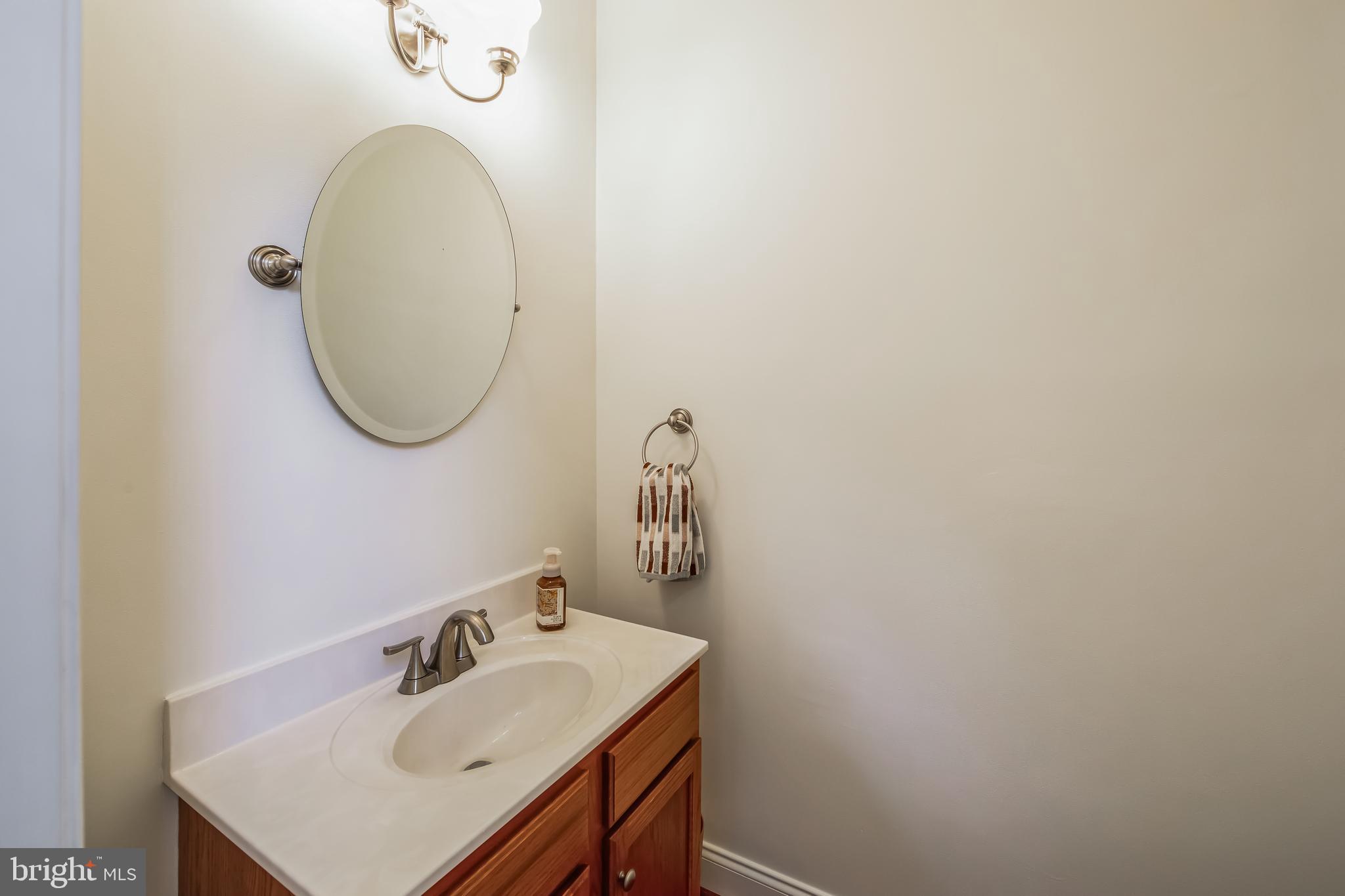 684 Highspire Road Glenmoore, PA 19343 - Photo 18 of 46 a bathroom with a sink and a mirror