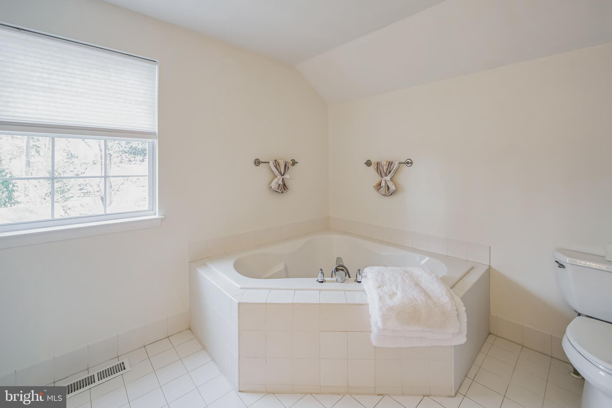 684 Highspire Road Glenmoore, PA 19343 - Photo 22 of 46 a bath tub sitting in a bathroom next to a sink