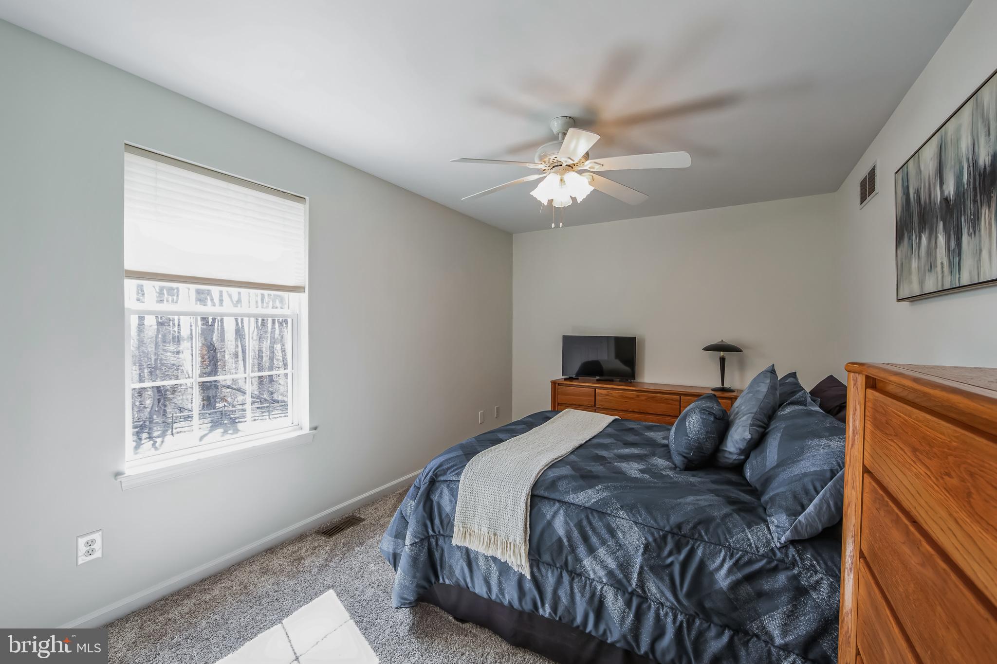 684 Highspire Road Glenmoore, PA 19343 - Photo 24 of 46 a bed room with a bed and a window
