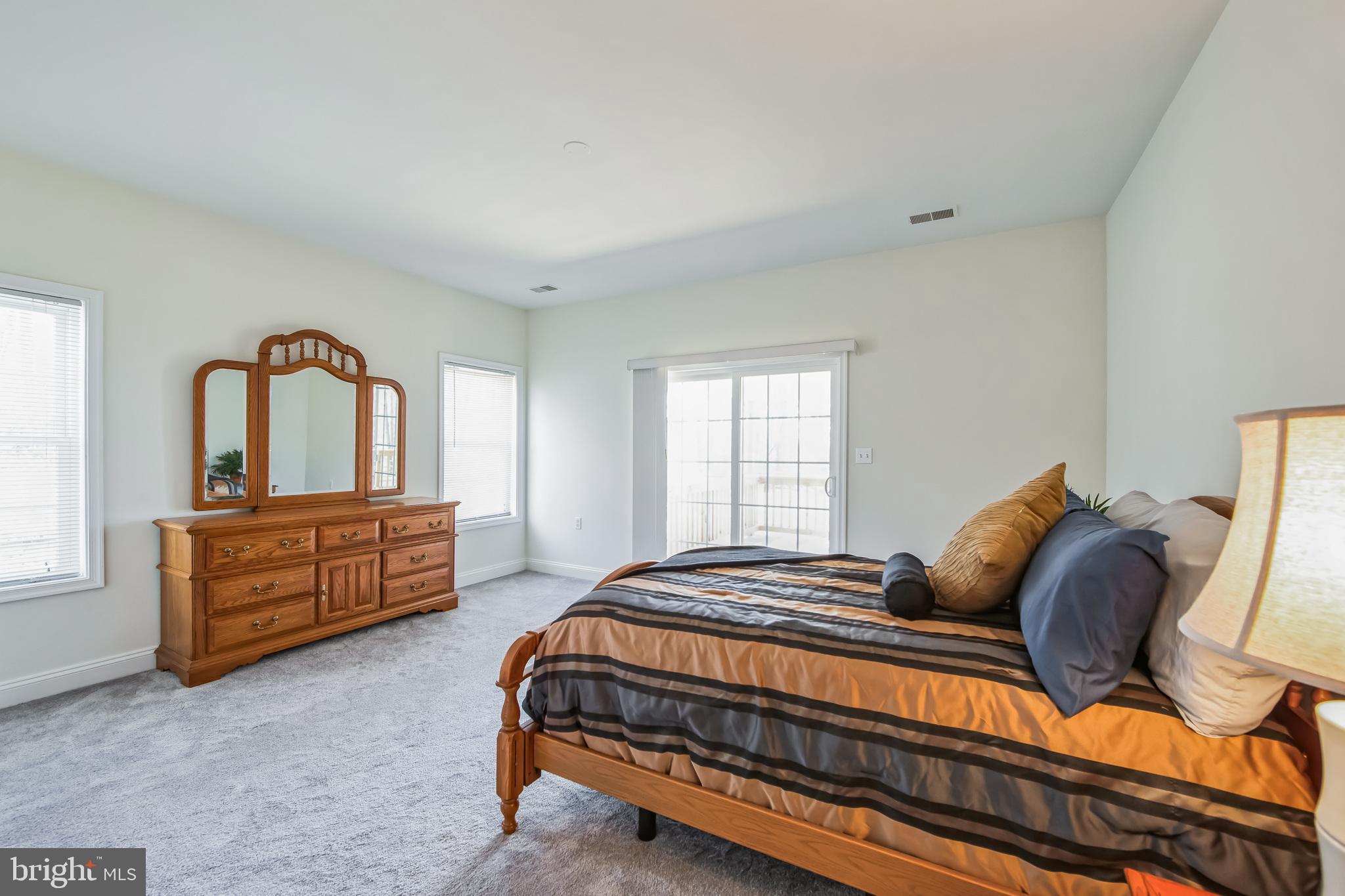 684 Highspire Road Glenmoore, PA 19343 - Photo 35 of 46 a bedroom with a bed and a dresser