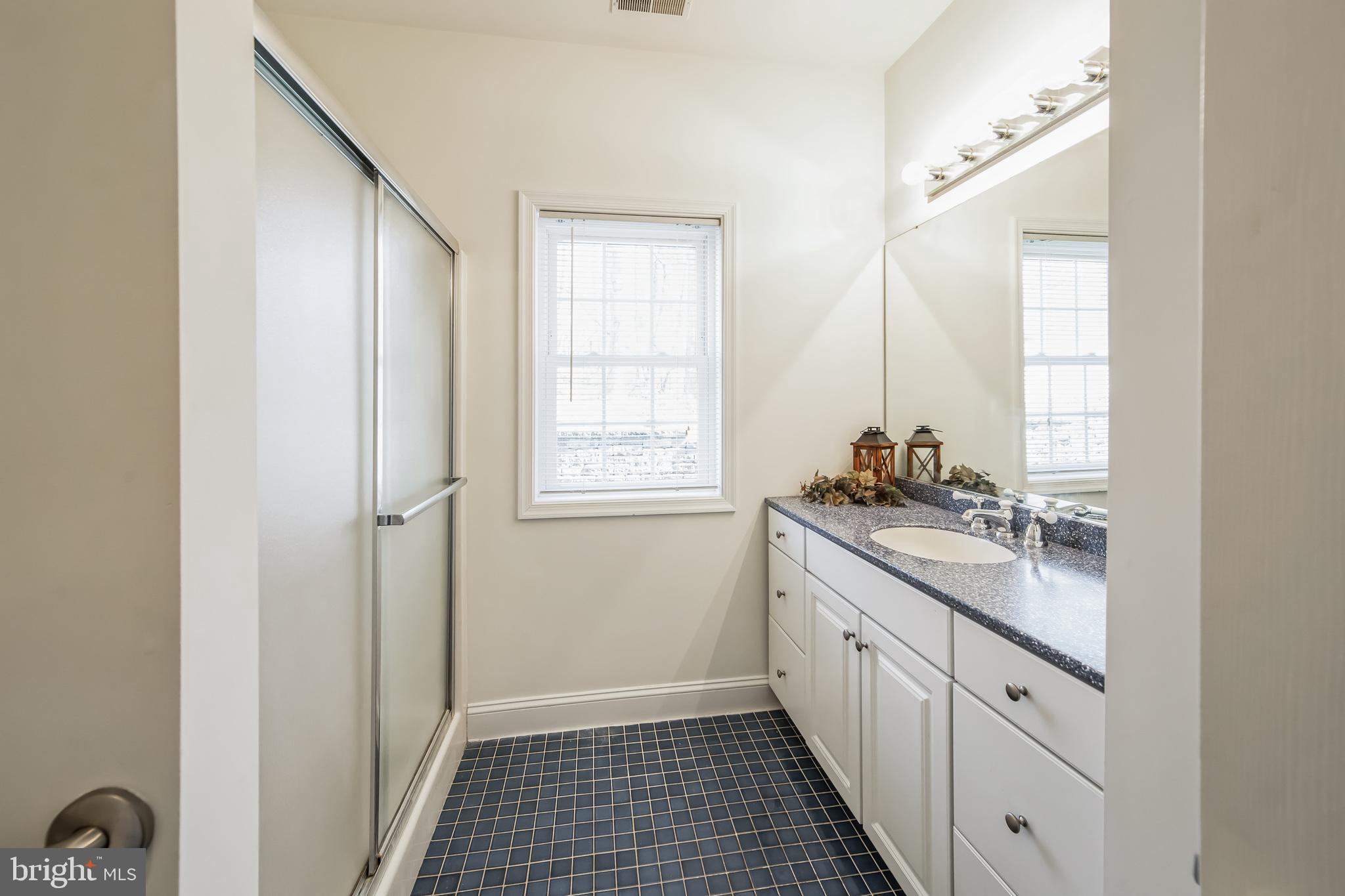 684 Highspire Road Glenmoore, PA 19343 - Photo 36 of 46 a kitchen with a sink and a window