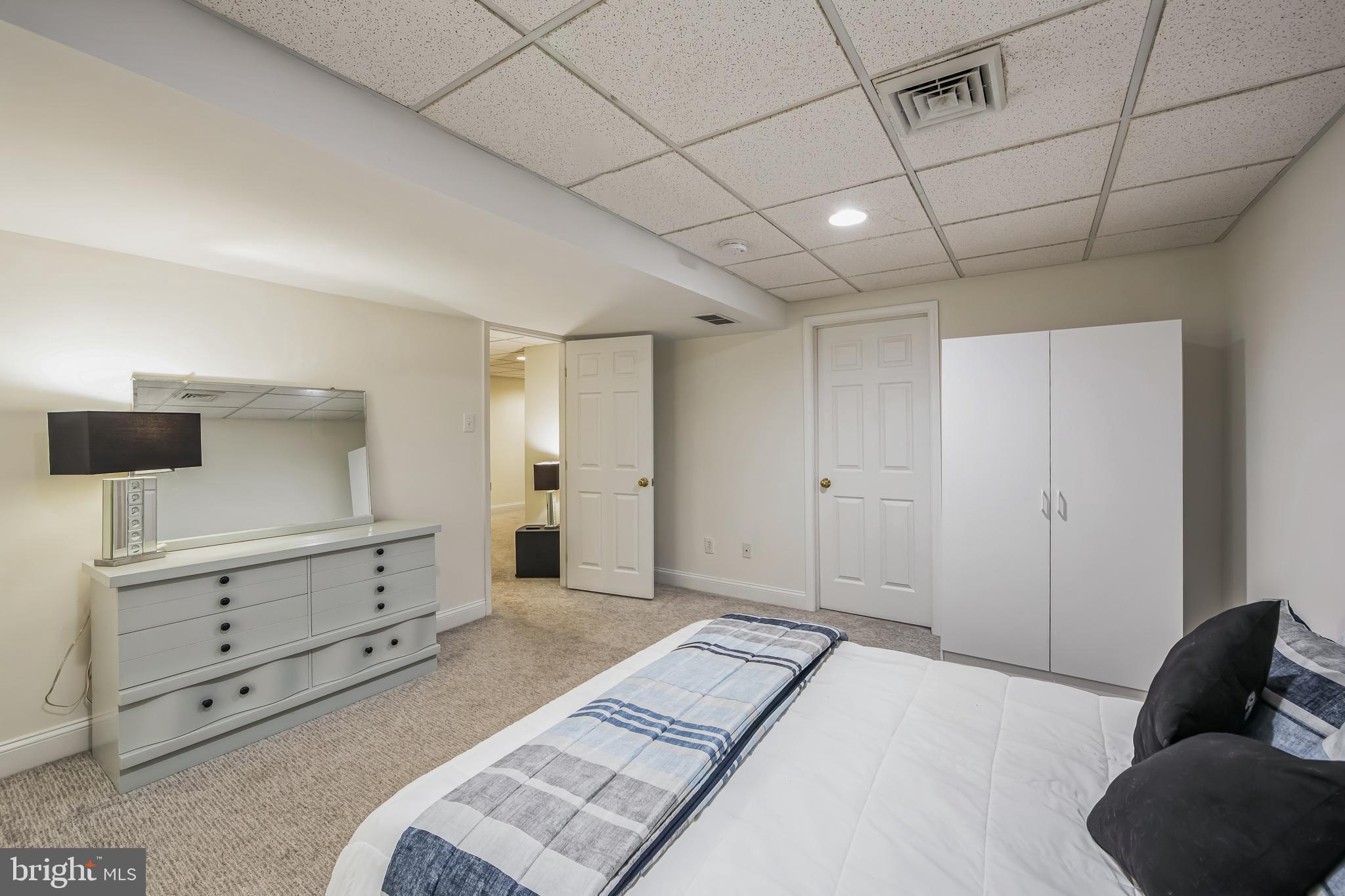 684 Highspire Road Glenmoore, PA 19343 - Photo 40 of 46 a bedroom with a bed and furniture