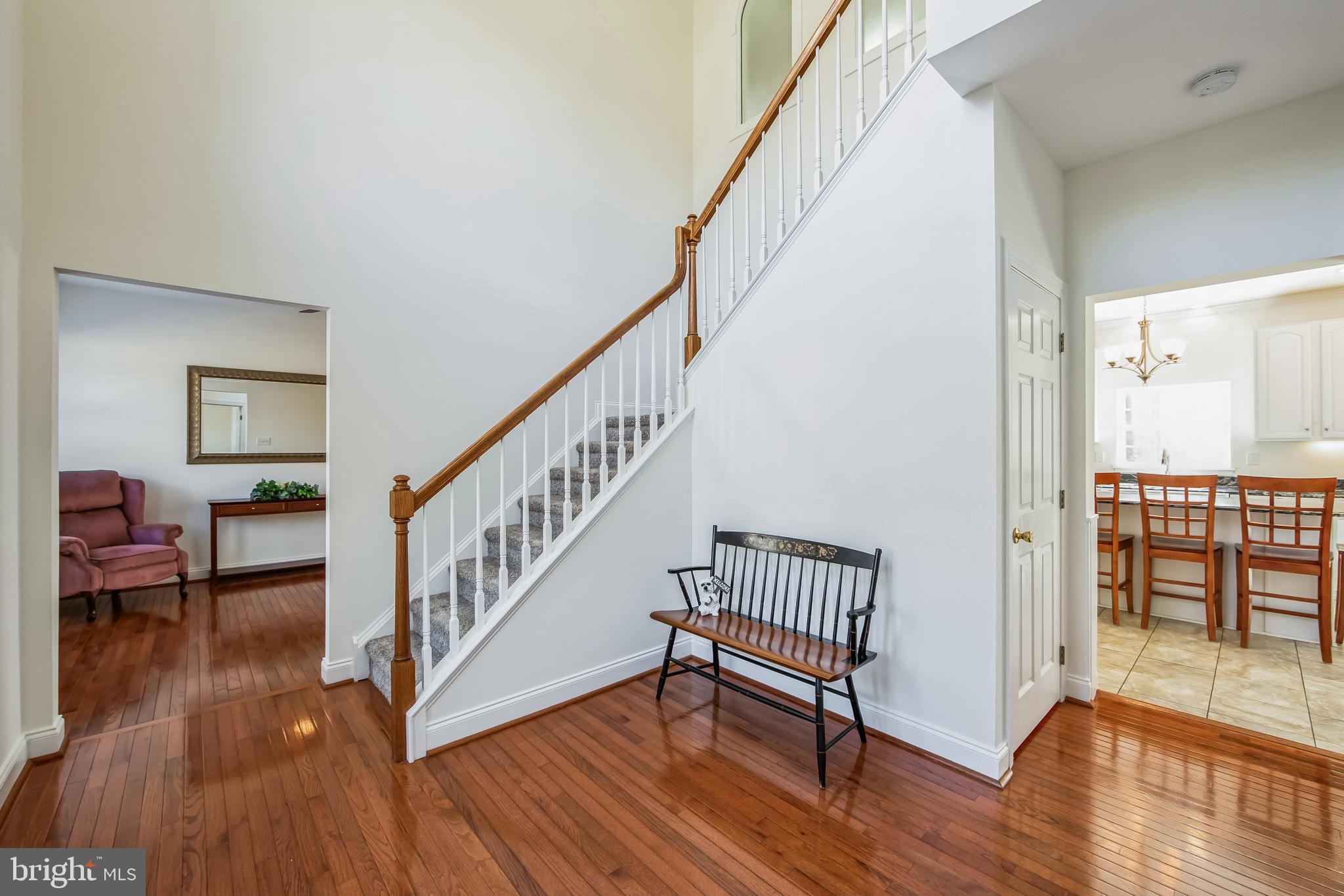 684 Highspire Road Glenmoore, PA 19343 - Photo 4 of 46 a view of front door with dining room and wooden floor