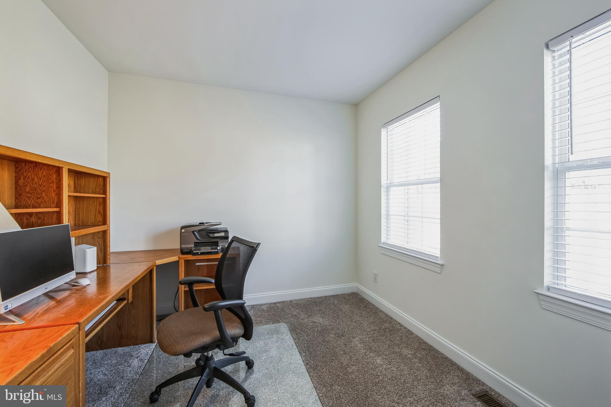 684 Highspire Road Glenmoore, PA 19343 - Photo 5 of 46 a workspace with furniture and a window