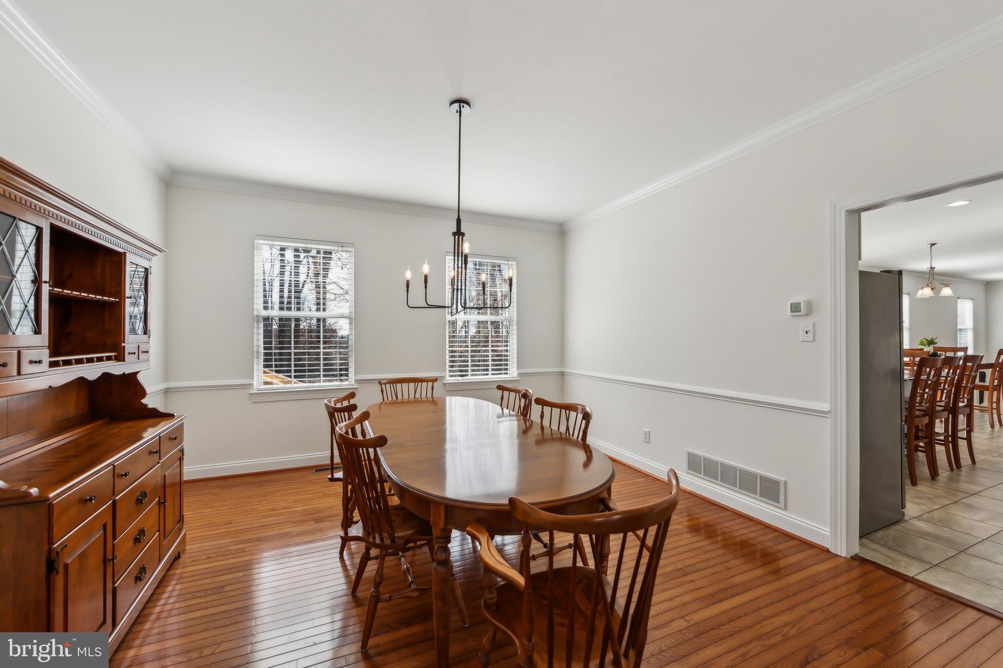 684 Highspire Road Glenmoore, PA 19343 - Photo 9 of 46 a view of a dining room with furniture window and wooden floor