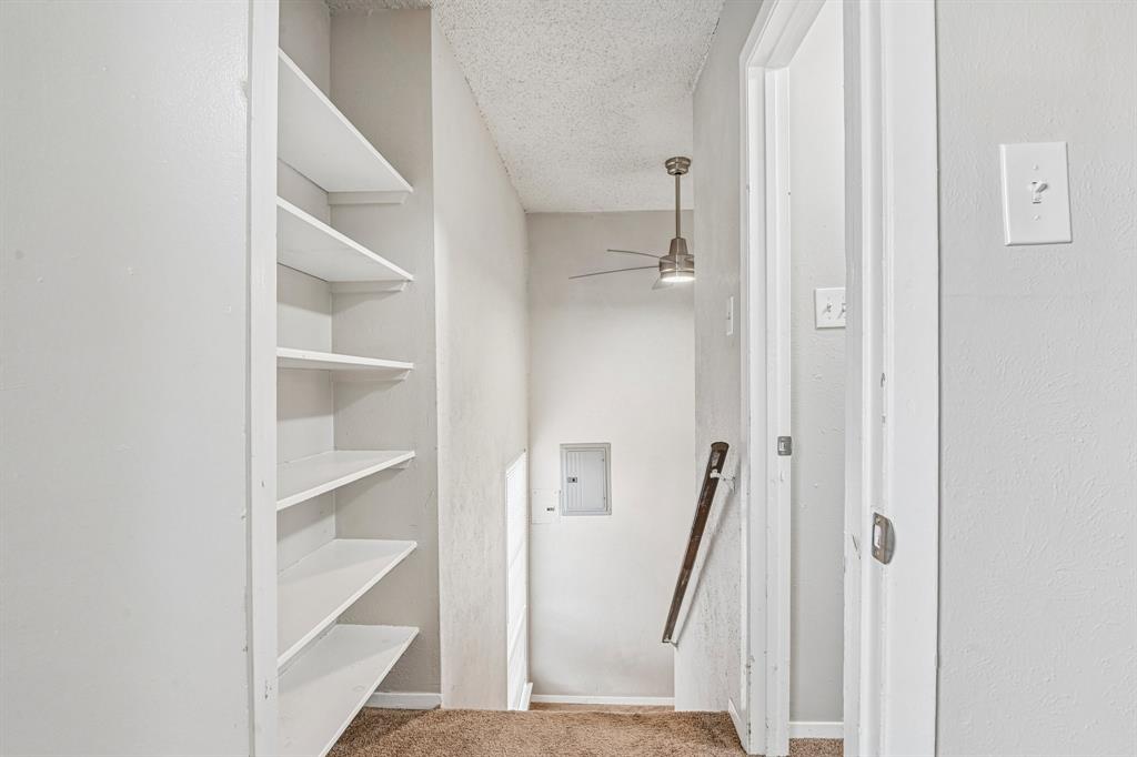 5534 Boca Raton Boulevard, Unit 292 Fort Worth, TX 76112 - Photo 18 of 31 a view of a hallway with closet
