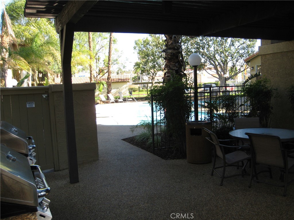 2085 Highpointe Drive Corona, CA 92879 - Photo 14 of 17 a view of a porch with furniture and garden