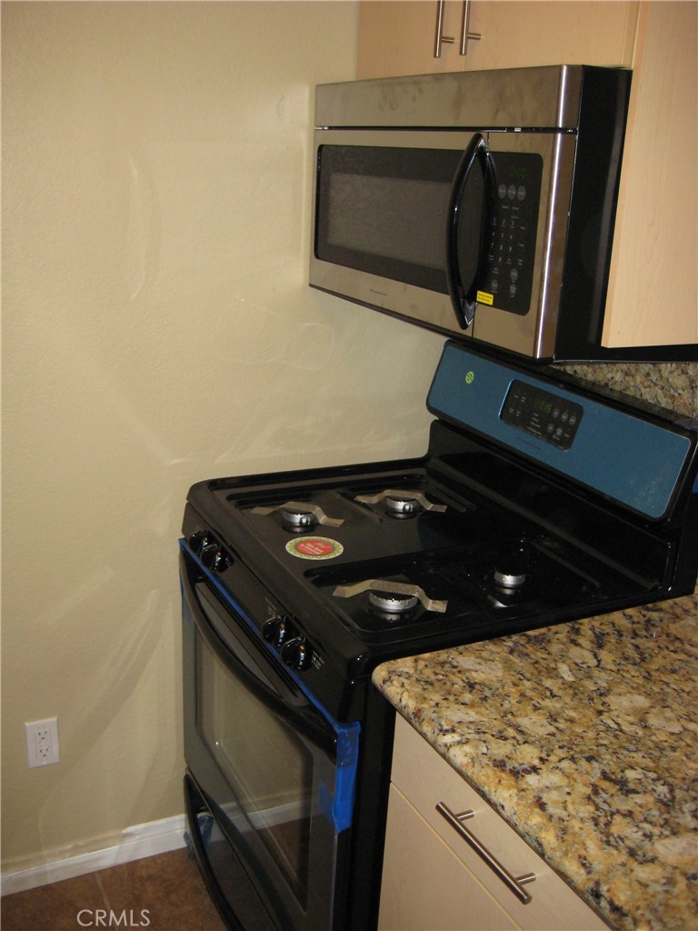 2085 Highpointe Drive Corona, CA 92879 - Photo 5 of 17 a close up of a stove top oven