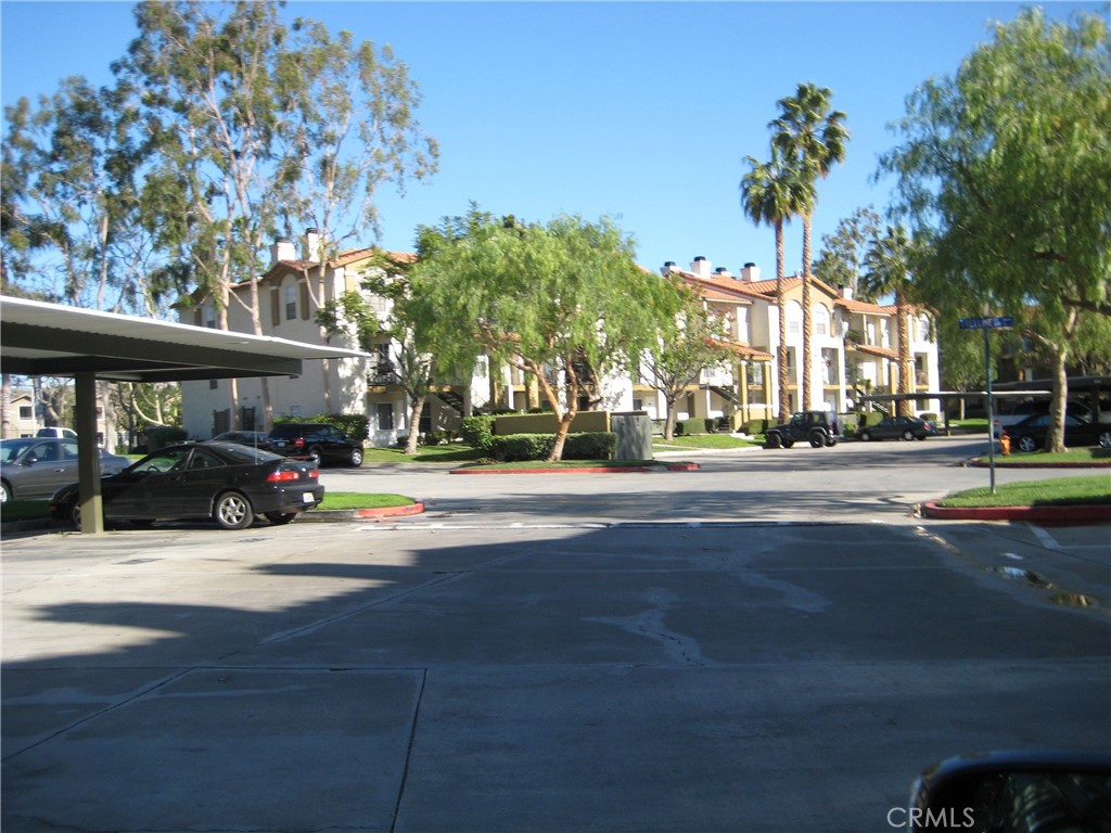 2085 Highpointe Drive Corona, CA 92879 - Photo 9 of 17 a view of street with cars and trees