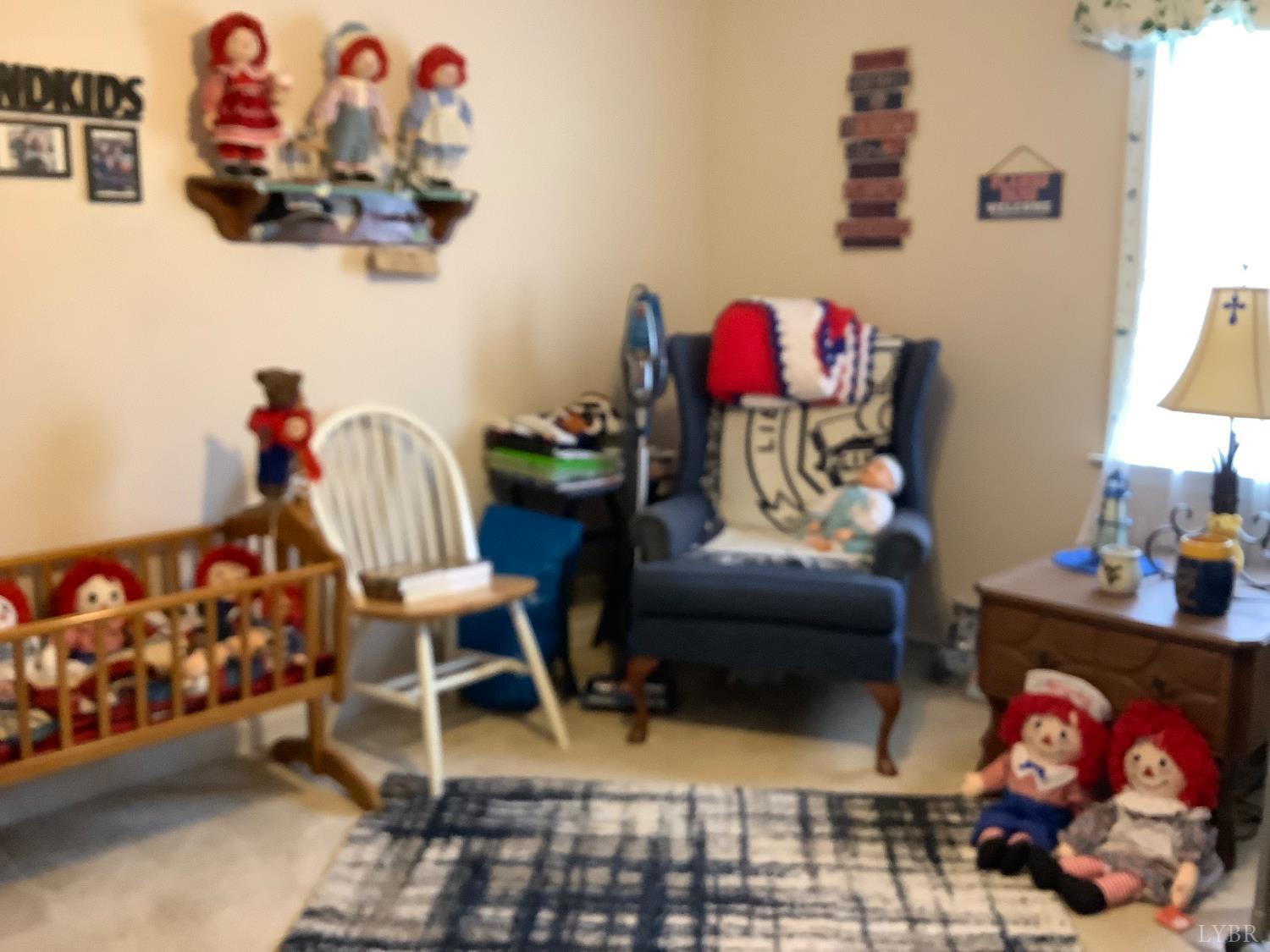 1564 Calohan Road Rustburg, VA 24588 - Photo 13 of 29 a living room with furniture and a couch