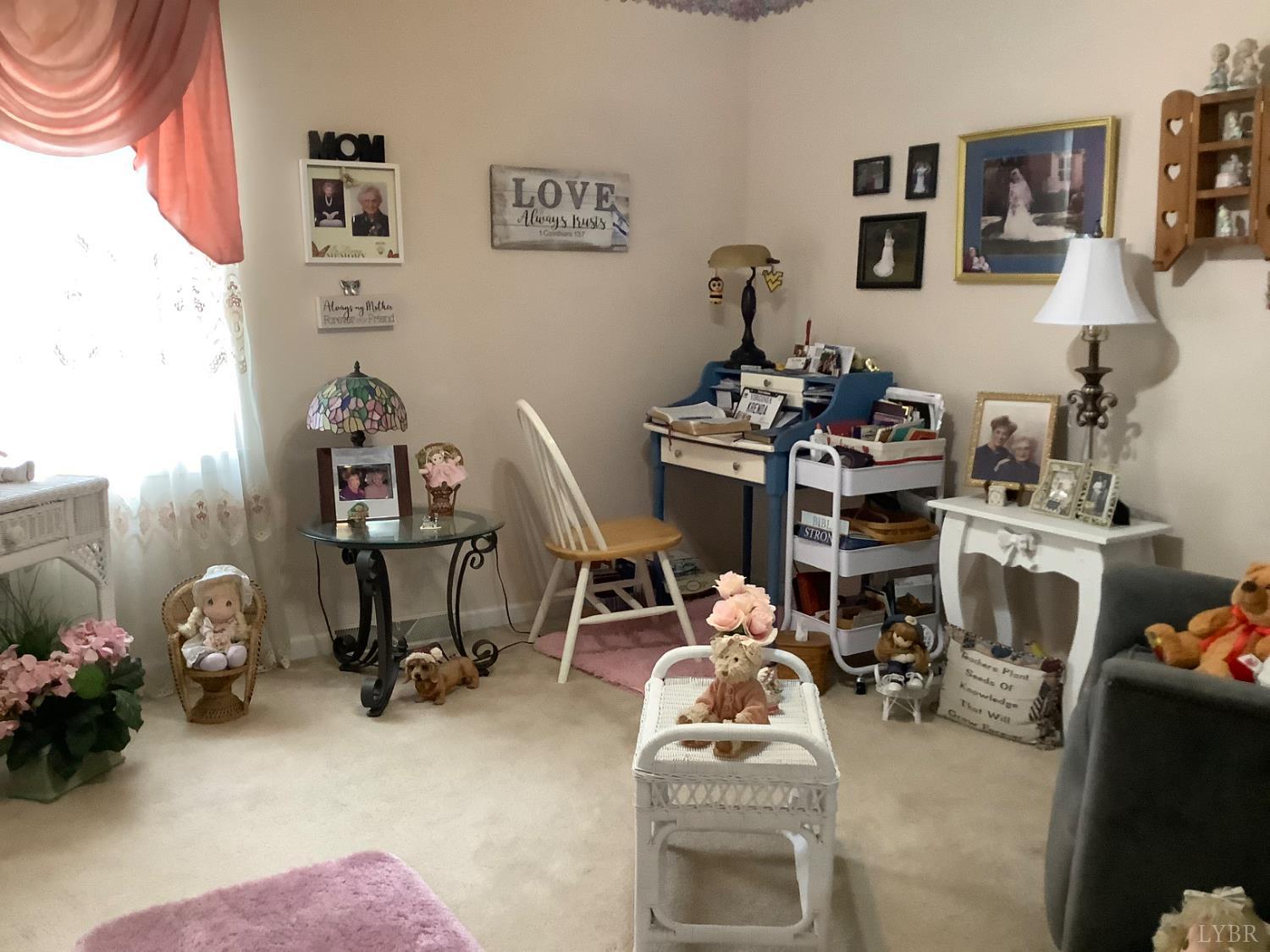 1564 Calohan Road Rustburg, VA 24588 - Photo 16 of 29 a view of a room with workspace and a couch