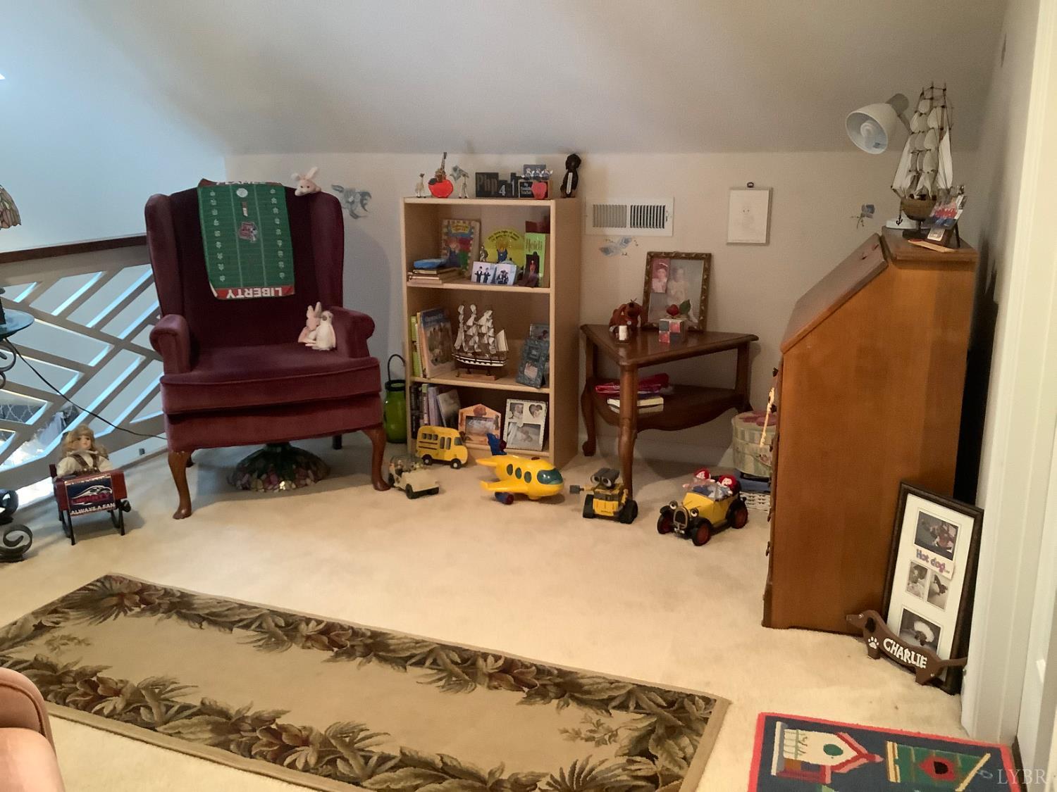 1564 Calohan Road Rustburg, VA 24588 - Photo 23 of 29 a bed room with a bed and a television