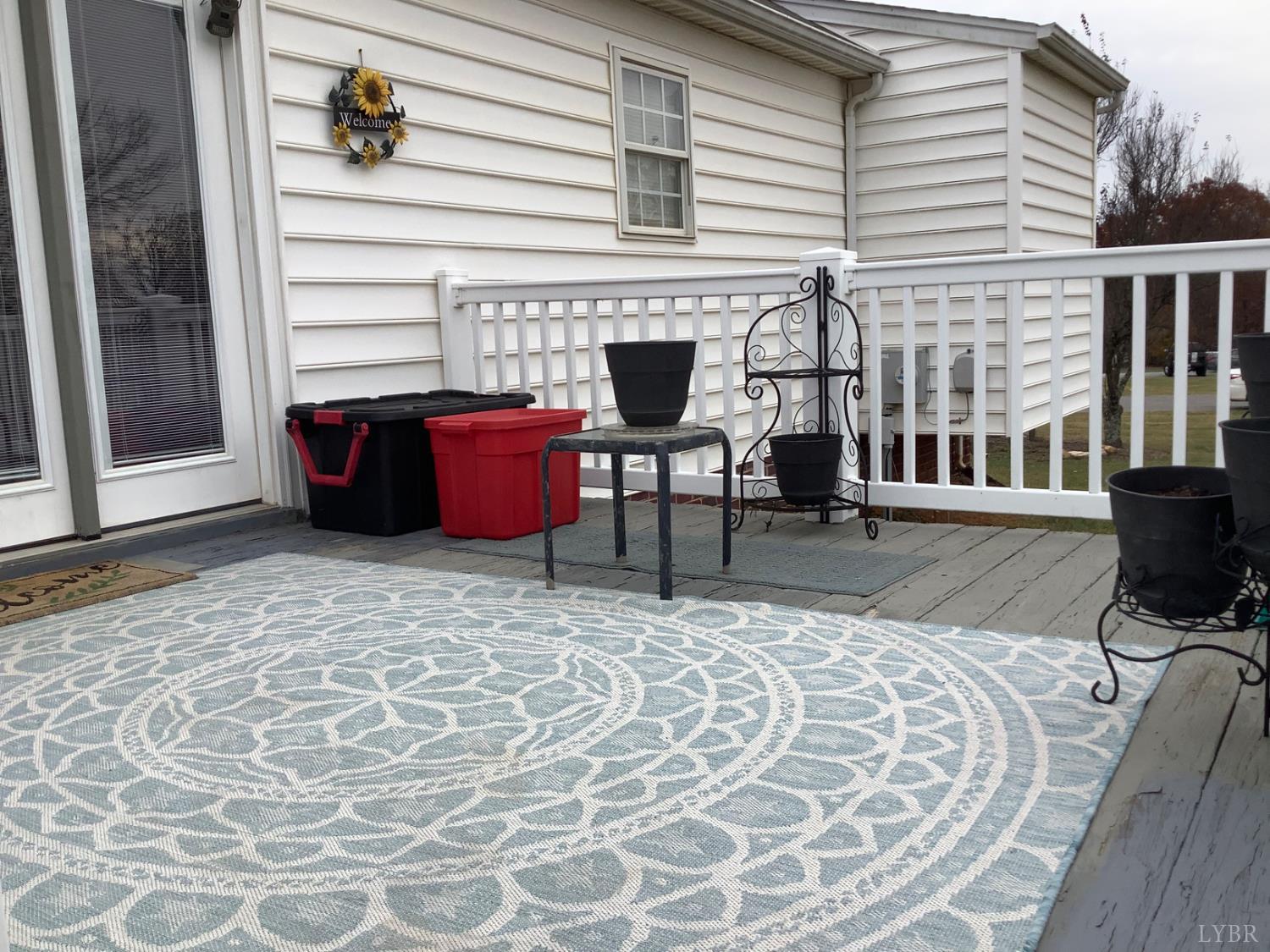 1564 Calohan Road Rustburg, VA 24588 - Photo 26 of 29 a balcony with table and chairs