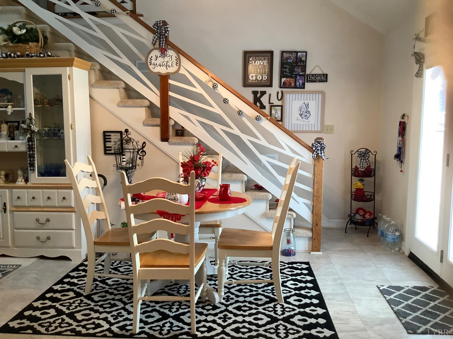 1564 Calohan Road Rustburg, VA 24588 - Photo 6 of 29 a room with furniture and stairs