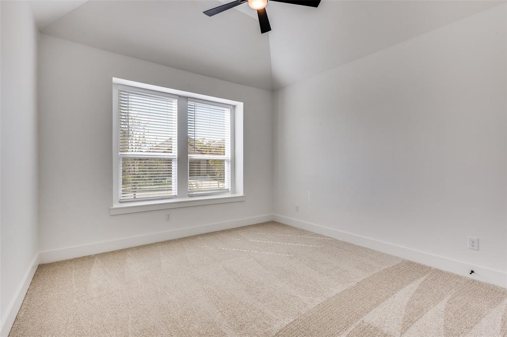 3308 Lakestriker Road Pilot Point, TX 76258 - Photo 15 of 25 an empty room with a window