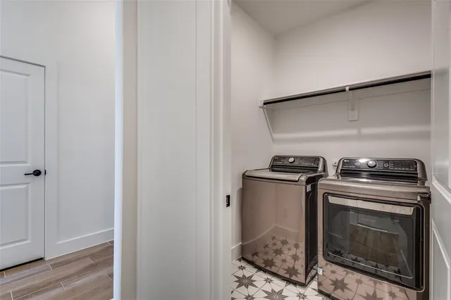 a stove top oven sitting inside of a kitchen