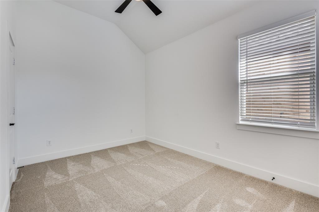 3308 Lakestriker Road Pilot Point, TX 76258 - Photo 18 of 25 an empty room with windows