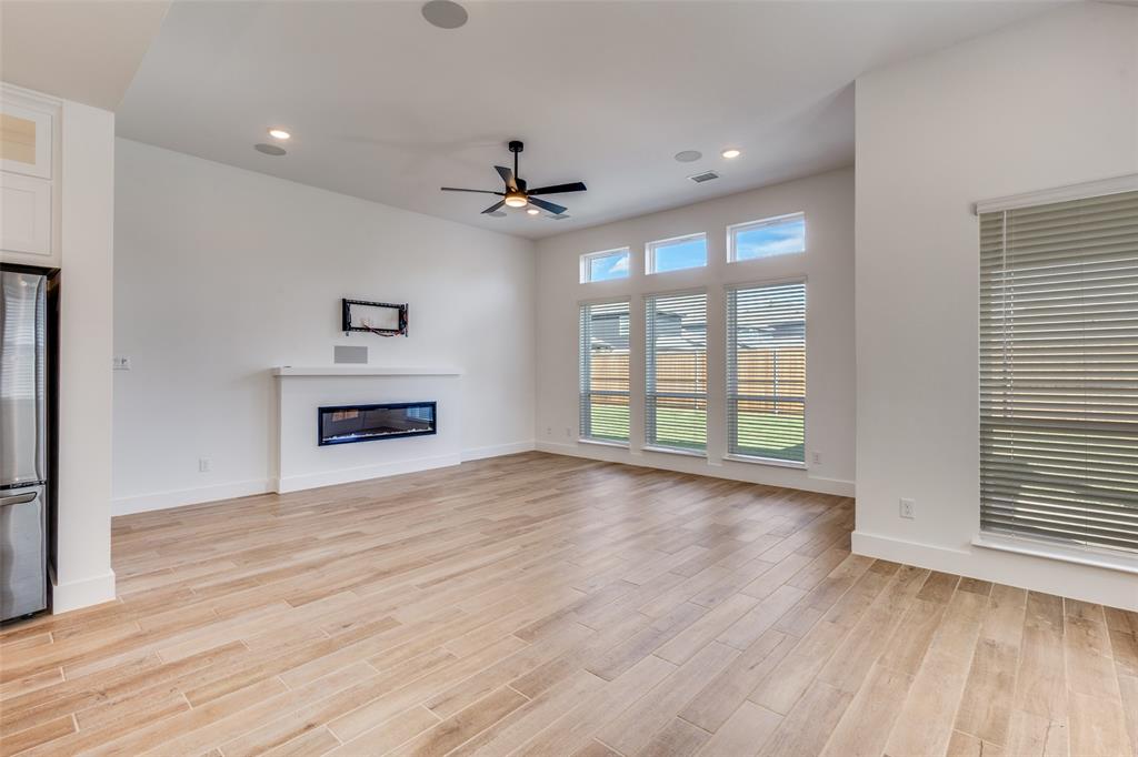 3308 Lakestriker Road Pilot Point, TX 76258 - Photo 10 of 25 a view of livingroom with hardwood floor and window
