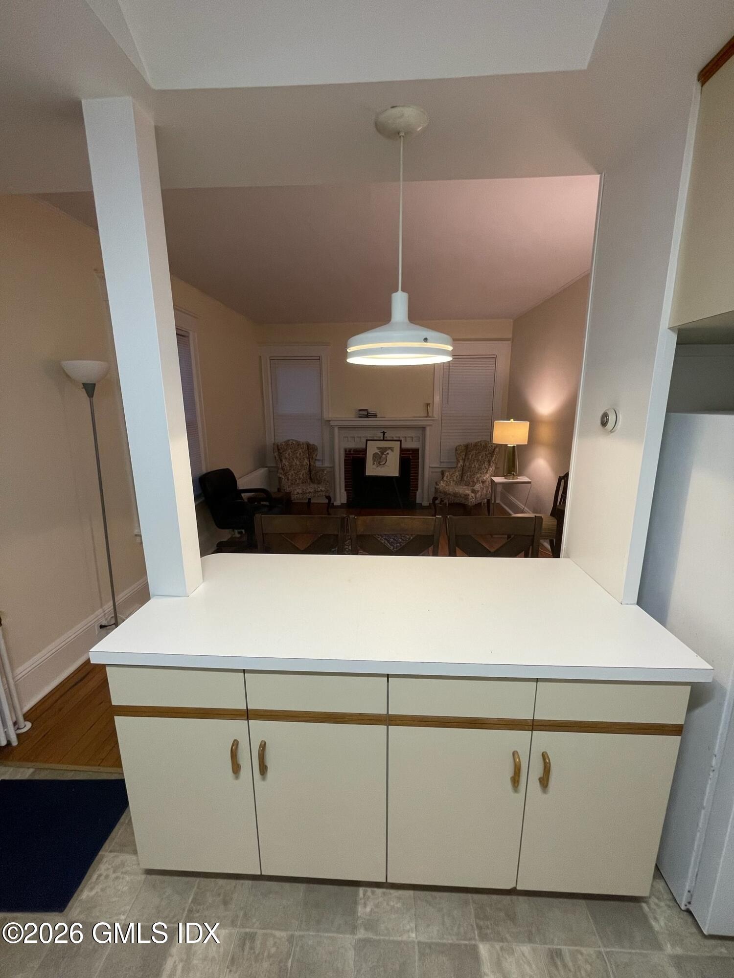 90 Riverside Avenue, Unit 1 Riverside, CT 06878 - Photo 6 of 10 a view of kitchen with stainless steel appliances sink and wooden floor