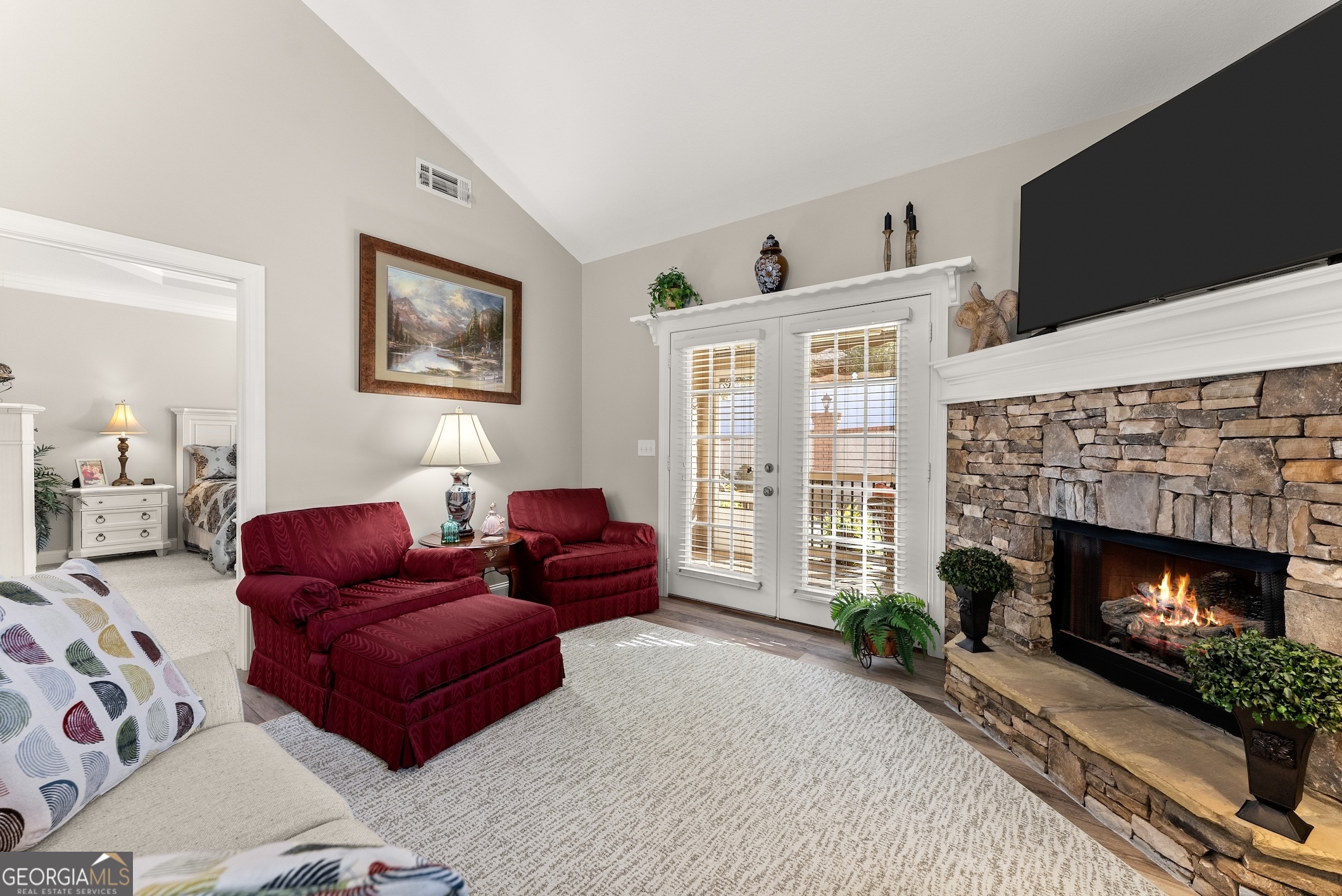 92 Colonial Drive, Unit 1 Cleveland, GA 30528 - Photo 14 of 43 a living room with furniture and a fireplace