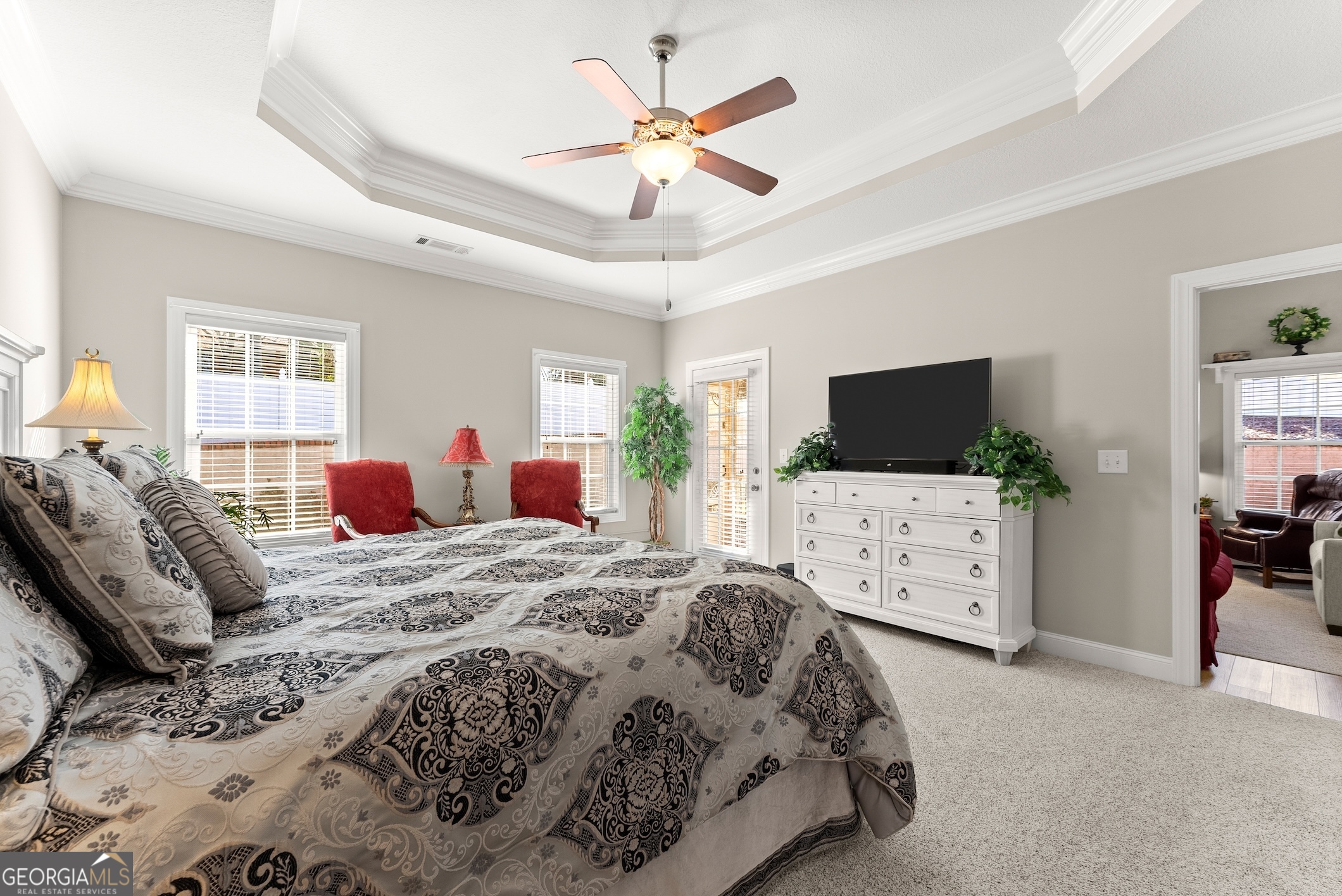 92 Colonial Drive, Unit 1 Cleveland, GA 30528 - Photo 17 of 43 a bedroom with a bed and a flat screen tv