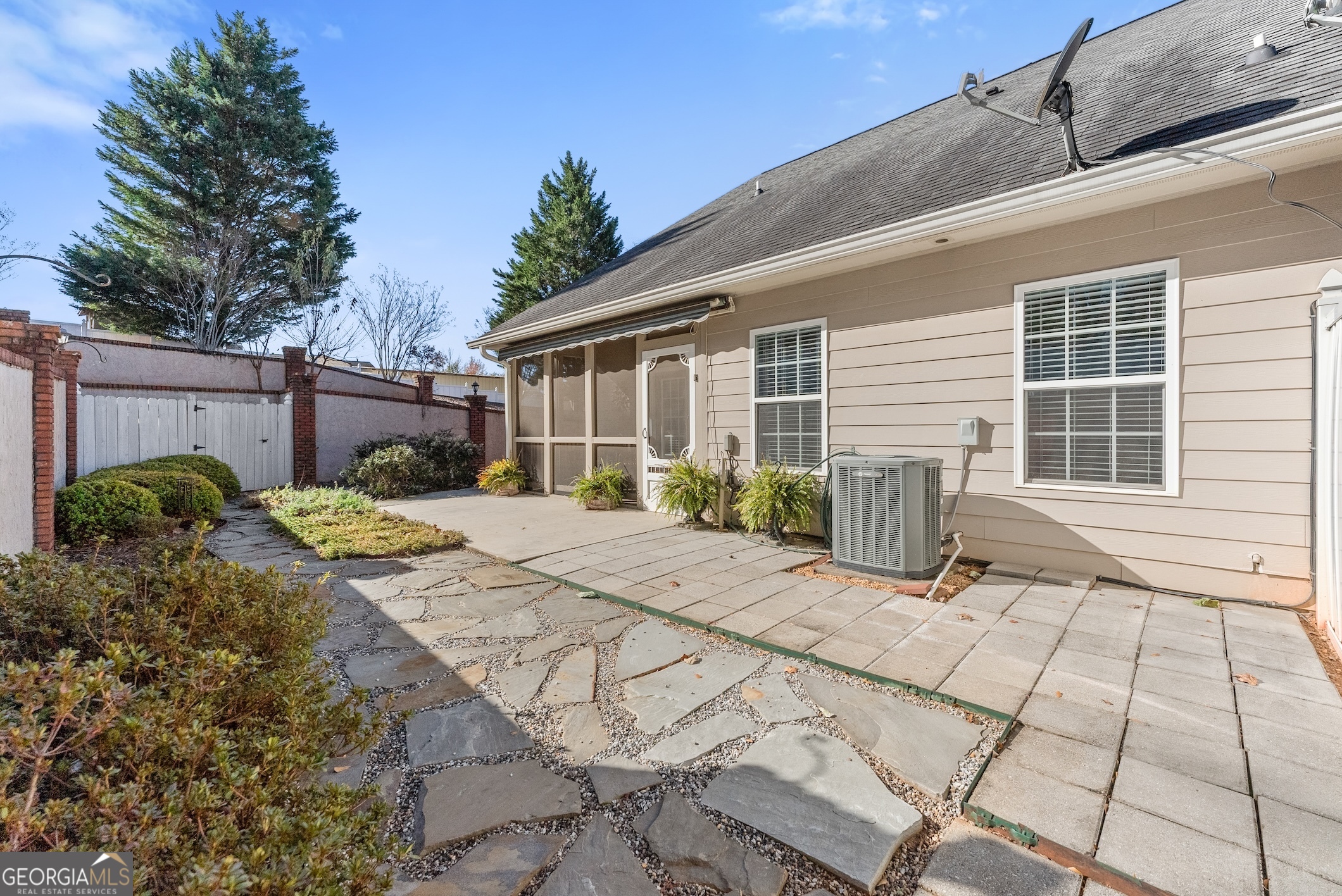 92 Colonial Drive, Unit 1 Cleveland, GA 30528 - Photo 27 of 43 a view of a house with backyard and sitting area