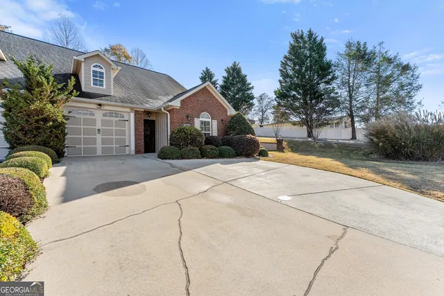 a house view with a garden space