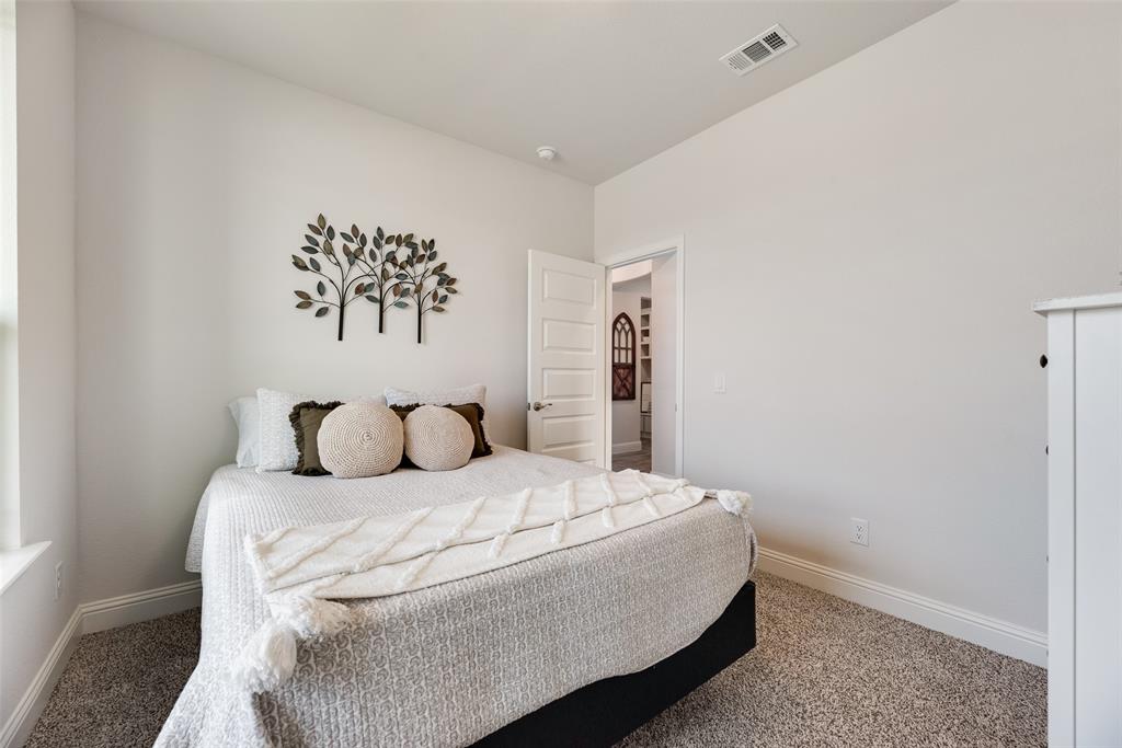 645 Mb Way South Pilot Point, TX 76258 - Photo 25 of 37 Bedroom offers a comfortable layout with soft natural light and plenty of room to make the space your own.