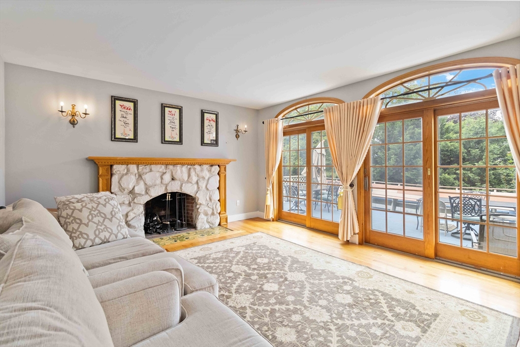 141 Gardiner Road Quincy, MA 02169 - Photo 13 of 35 a living room with furniture and a fireplace