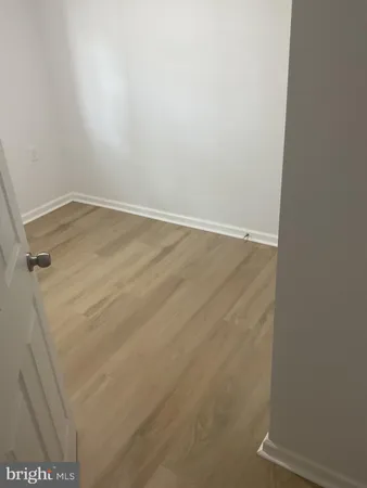 a bathroom with a toilet sink and shower