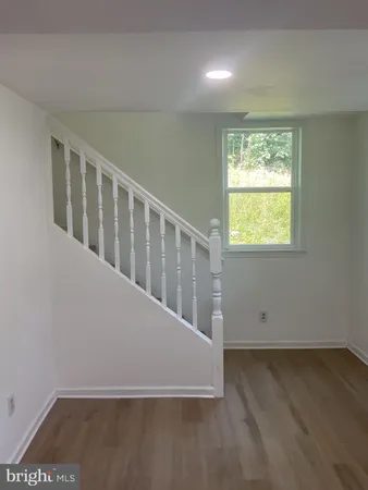 a view of a bathroom from a hallway